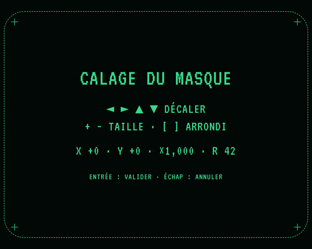 La mire de calage du masque : un cadre pointillé aux coins arrondis, quatre croix de calage, et les réglages au clavier